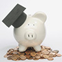 piggy bank with graduation cap