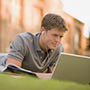 man looking at laptop
