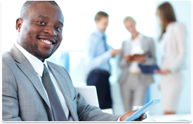 man in business suit smiling