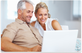 couple looking at laptop screen