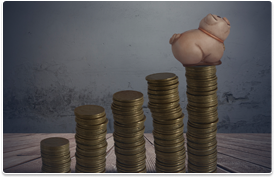 pig sitting on coin stack