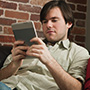 man looking at cellphone